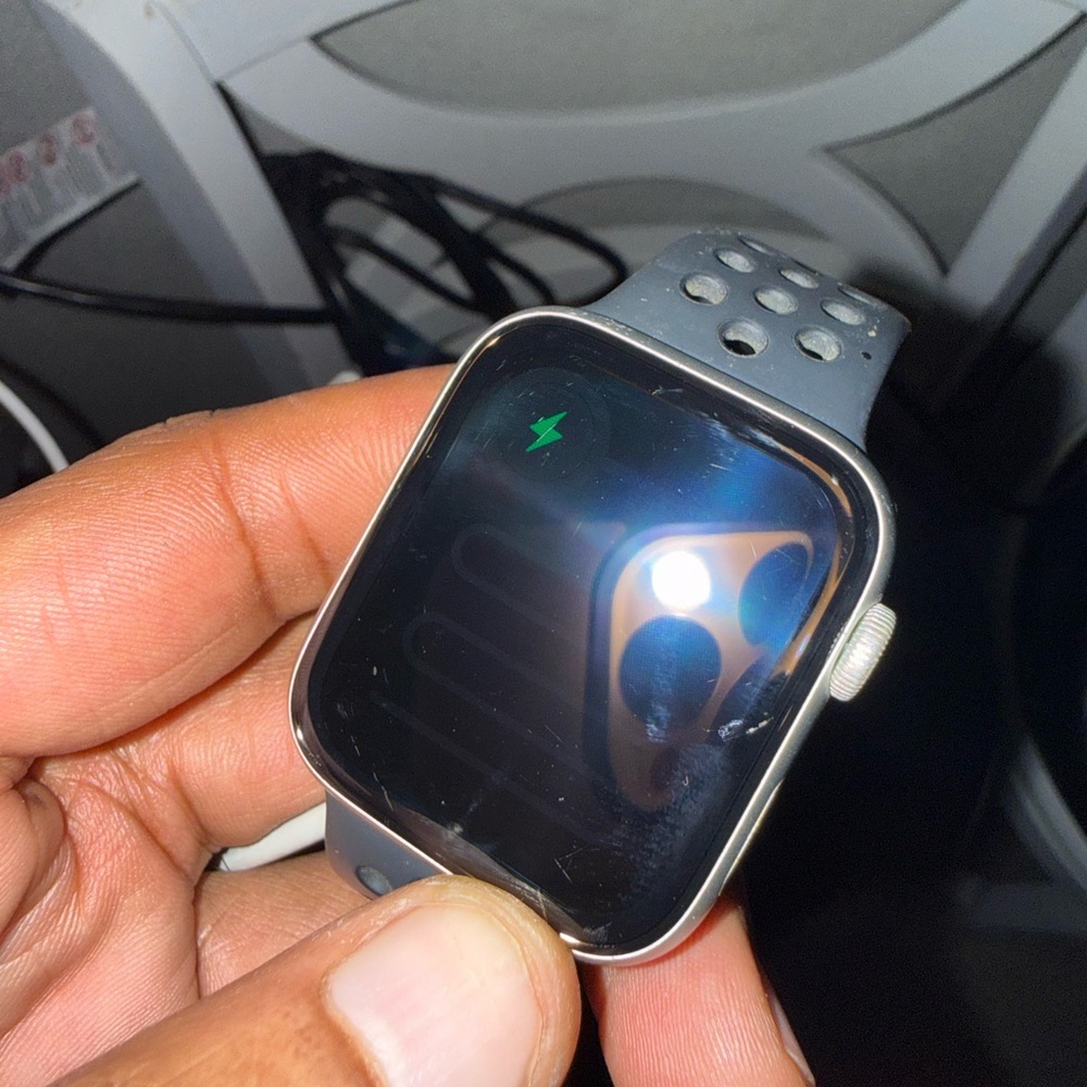 Sleek Gray Apple Smartwatch with Perforated Strap series 4 with box and charger - Picture 2 of 2
